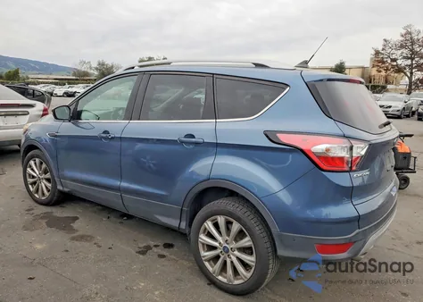 2018 Ford Escape Titanium z USA, uszkodzony, nr VIN 1FMCU0J90JUC09727